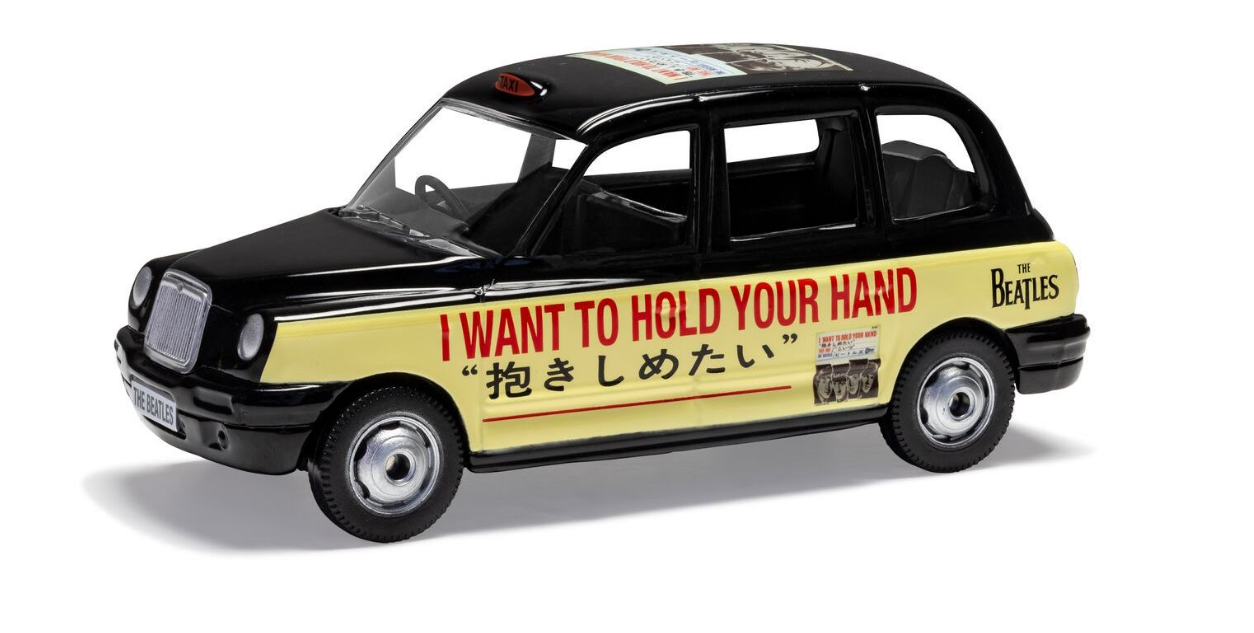 Corgi 1/36 Scale The Beatles London Taxi - I Want To Hold Your Die Cast Model
