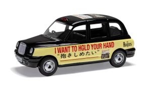 Corgi 1/36 Scale The Beatles London Taxi - I Want To Hold Your Die Cast Model